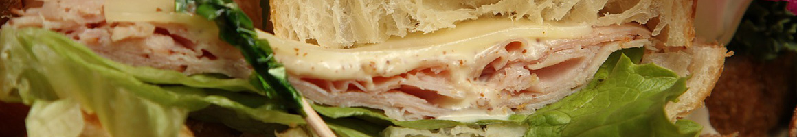 Eating Deli Sandwich at Lunchbox Deli restaurant in Grosse Pointe Park, MI.